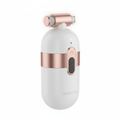 Cordless electric dog nail grinder in white and rose gold on white background